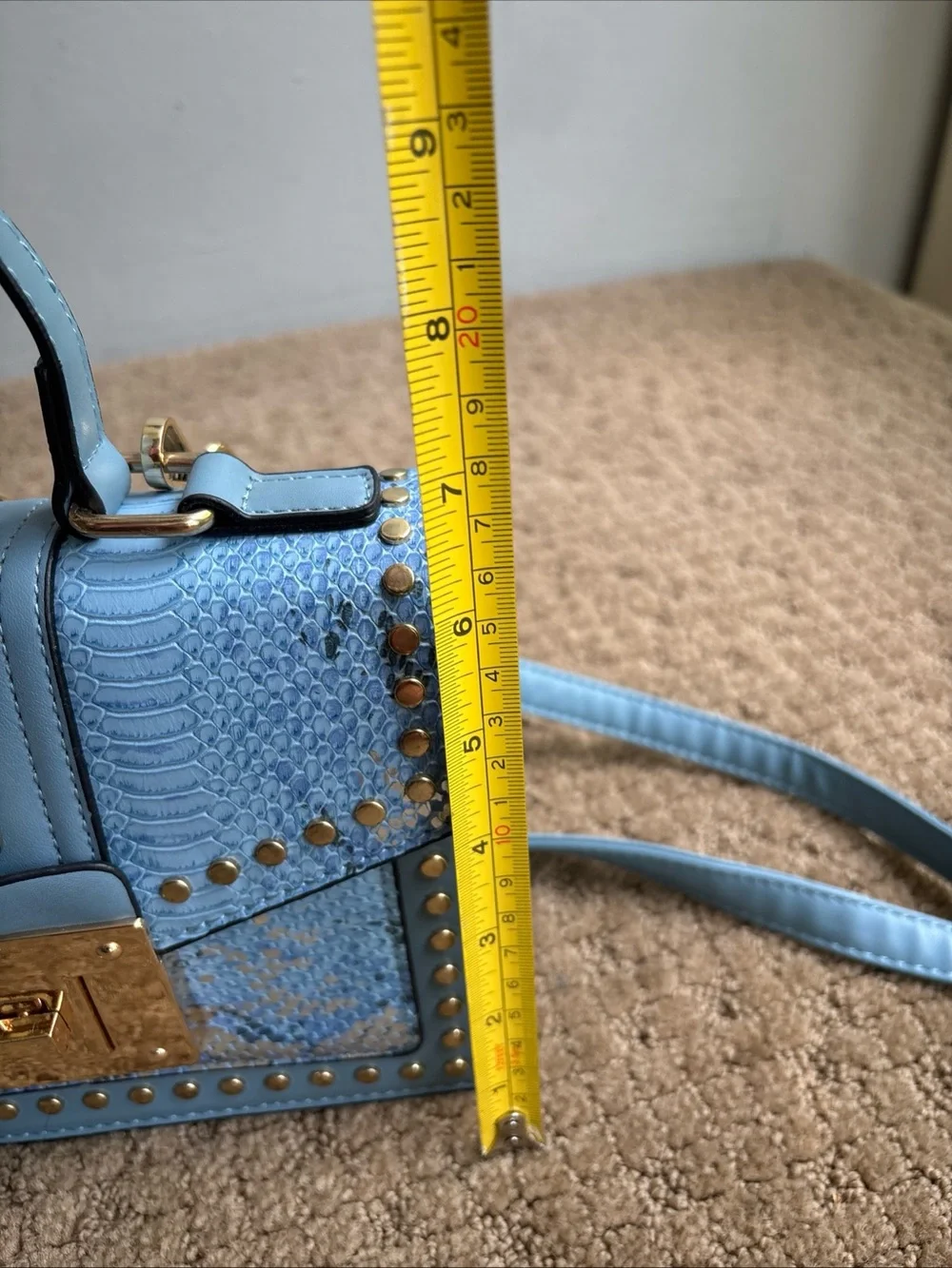 Faux snakeskin crossbody blue purse new with minor mark on bottom